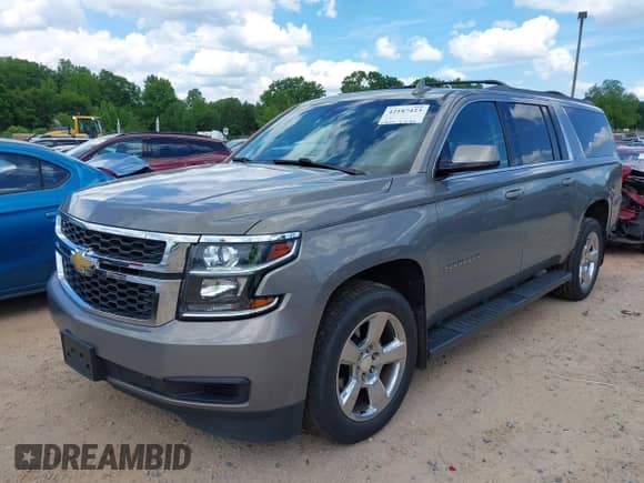2017 Chevrolet Suburban LT z VIN 1GNSCHKC9HR230706, wystawiony jako IAAI lot #42187423 z przebiegiem 117 432 mil mil oraz . Historia ofert i sprzedaży dostępna na DreamBid. Obrazek 2.