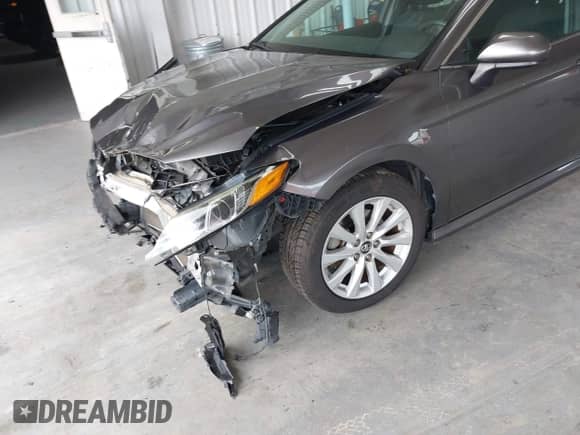 2019 Toyota Camry SE z VIN 4T1B11HK8KU763229, wystawiony jako IAAI lot #43320855 z przebiegiem 99 256 mil mil oraz . Historia ofert i sprzedaży dostępna na DreamBid. Obrazek 6.