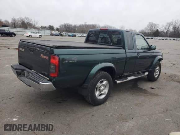 2000 Nissan Frontier XE z VIN 1N6ED26Y4YC372094, wystawiony jako Copart lot #44421205 z przebiegiem 156 058 mil mil oraz Szkoda całkowita • Salvage title. Historia ofert i sprzedaży dostępna na DreamBid. Obrazek 3.