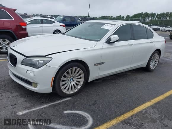 2011 BMW 7 Series 750i xDrive with VIN WBAKC6C52BC394674, listed as a IAAI auction lot 42973981 with 114,659 mi miles and . Bid and sale history available at DreamBid. Image 2.