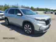 2024 Honda Pilot Touring with VIN 5FNYG1H74RB016366, listed as a Copart auction lot 64484215 with 24,788 mi miles and Salvage title. Bid and sale history available at DreamBid. Image 4.