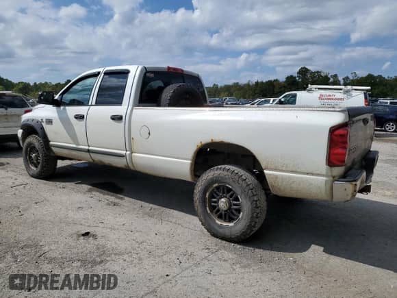 2007 Dodge 2500 SLT с VIN 1D7KS28A67J600706, выставлен на аукционе Copart как лот 54299495 с пробегом 373 717 миль миль и Списание • Salvage title. История ставок и продаж доступна на DreamBid. Изображение 2.