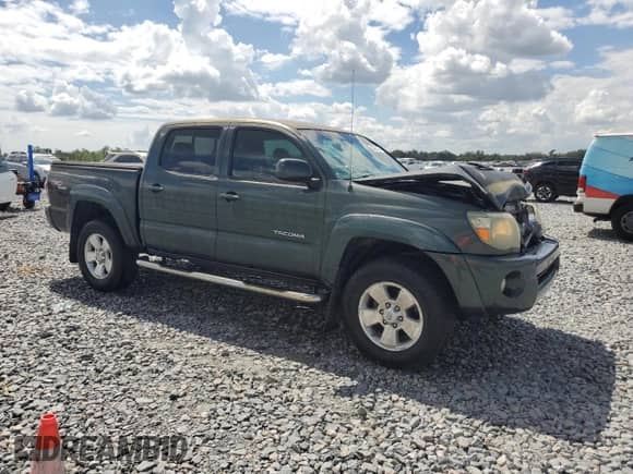 2010 Toyota Tacoma PreRunner z VIN 5TEJU4GN7AZ708023, wystawiony jako Copart lot #84866105 z przebiegiem 195 283 mil mil oraz Szkoda całkowita • Salvage title. Historia ofert i sprzedaży dostępna na DreamBid. Obrazek 4.