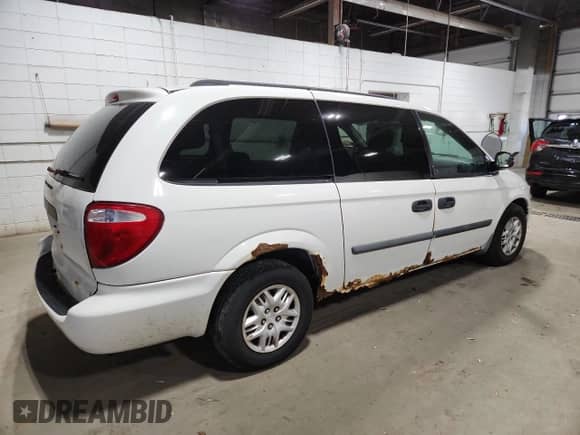 2007 Dodge Grand Caravan SE с VIN 1D4GP24R57B110560, выставлен на аукционе Copart как лот 85571885 с пробегом 176 849 миль миль и Списание • Salvage title. История ставок и продаж доступна на DreamBid. Изображение 3.