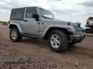 2014 Jeep Wrangler Sahara с VIN 1C4AJWBG5EL221498, выставлен на аукционе Copart как лот 69698425 с пробегом 43 821 миль миль и Списание • Salvage title. История ставок и продаж доступна на DreamBid. Изображение 4.
