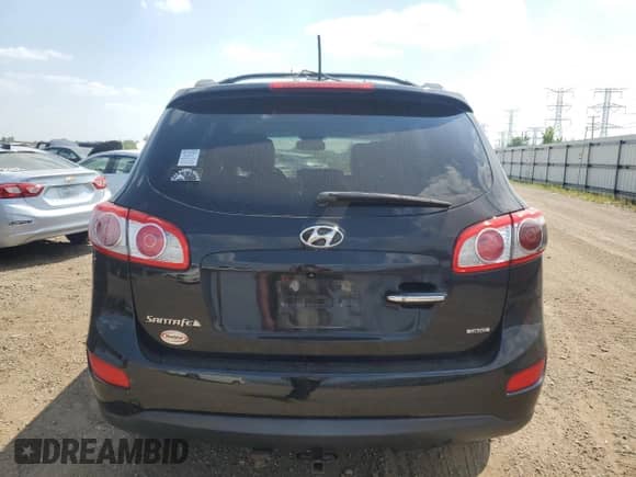 2012 Hyundai Santa Fe Limited с VIN 5XYZK4AG0CG114048, выставлен на аукционе Copart как лот 68904215 с пробегом 133 591 миль миль и Списание • Salvage title. История ставок и продаж доступна на DreamBid. Изображение 6.