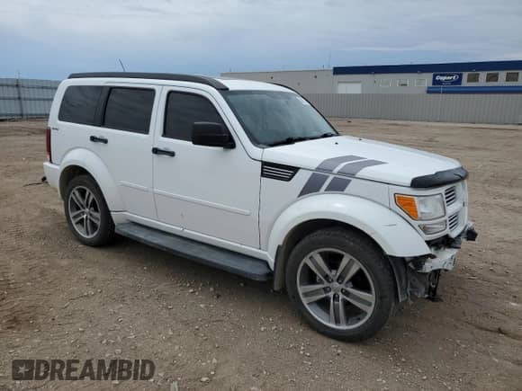 2011 Dodge Nitro Shock с VIN 1D4PU7GX8BW525499, выставлен на аукционе Copart как лот 58211105 с пробегом 87 420 миль миль и Списание • Salvage title. История ставок и продаж доступна на DreamBid. Изображение 4.