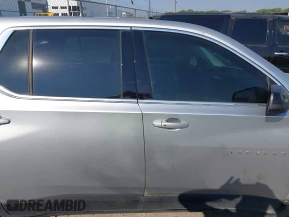 2021 Chevrolet Traverse LS with VIN 1GNERFKW2MJ128022, listed as a IAAI auction lot 43224649 with 145,685 mi miles and . Bid and sale history available at DreamBid. Image 13.