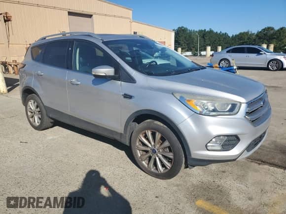2017 Ford Escape Titanium with VIN 1FMCU9J98HUE25145, listed as a Copart auction lot 86802075 with 156,471 mi miles and Clean title. Bid and sale history available at DreamBid. Image 4.