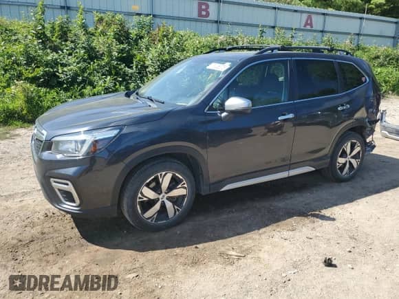 2019 Subaru Forester Touring with VIN JF2SKAWC4KH416746, listed as a Copart auction lot 71036375 with 104,043 mi miles and Clean title. Bid and sale history available at DreamBid. Image 1.