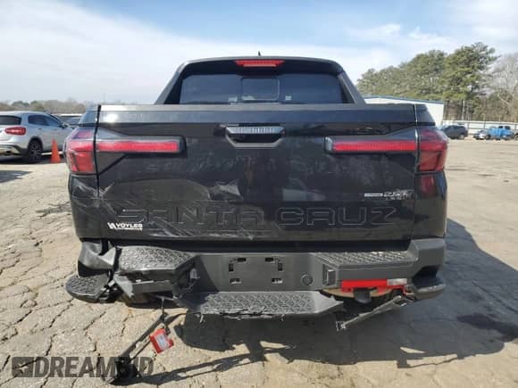 2023 Hyundai Santa Cruz Limited с VIN 5NTJEDAF8PH042270, выставлен на аукционе Copart как лот 43851544 с пробегом 19 899 миль миль и Списание • Salvage title. История ставок и продаж доступна на DreamBid. Изображение 6.