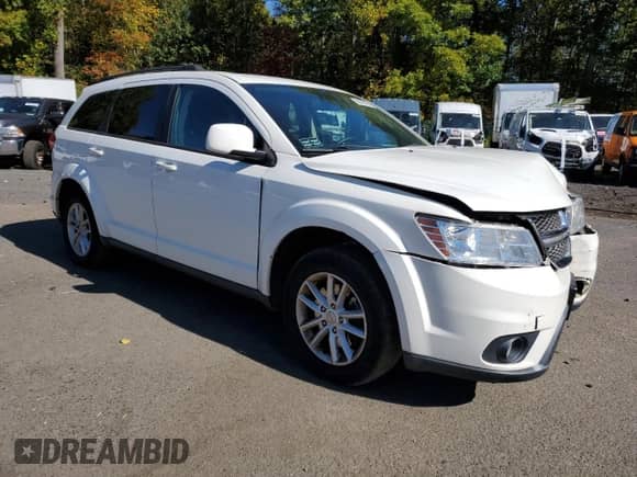 2015 Dodge Journey SXT with VIN 3C4PDDBG3FT613276, listed as a Copart auction lot 85899795 with 151,311 mi miles and Salvage title. Bid and sale history available at DreamBid. Image 4.