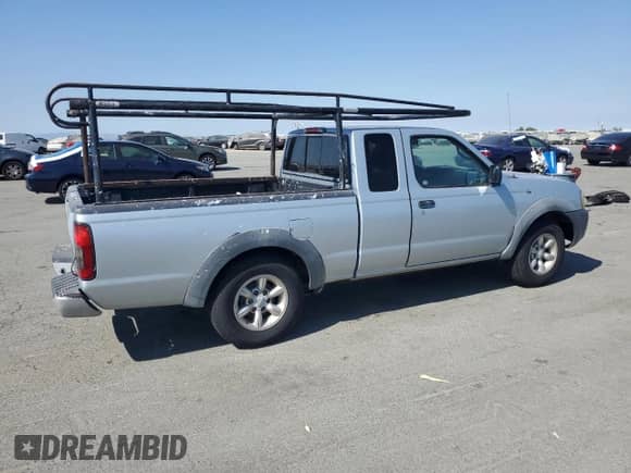 2002 Nissan Frontier XE with VIN 1N6DD26S52C383121, listed as a Copart auction lot 68583585 with 238,873 mi miles and Clean title. Bid and sale history available at DreamBid. Image 3.