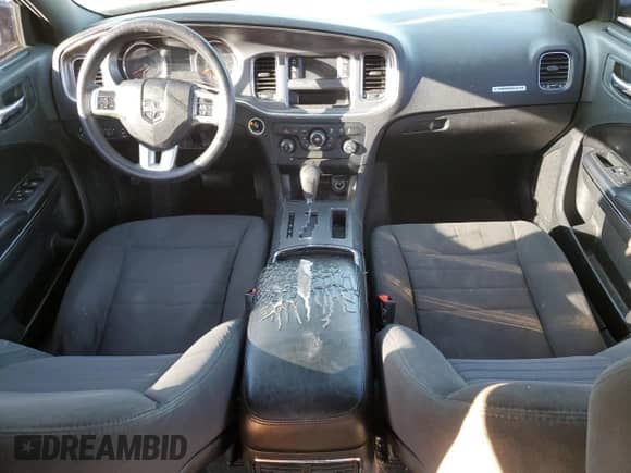 2013 Dodge Charger SE с VIN 2C3CDXBG9DH706040, выставлен на аукционе Copart как лот 70147275 с пробегом 268 845 миль миль и На запчасти • Non repairable. История ставок и продаж доступна на DreamBid. Изображение 8.