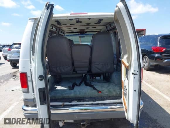 1999 Ford Econoline Cargo Recreational with VIN 1FDRE14L2XHA41059, listed as a IAAI auction lot 42067879 with 149,185 mi miles and . Bid and sale history available at DreamBid. Image 19.