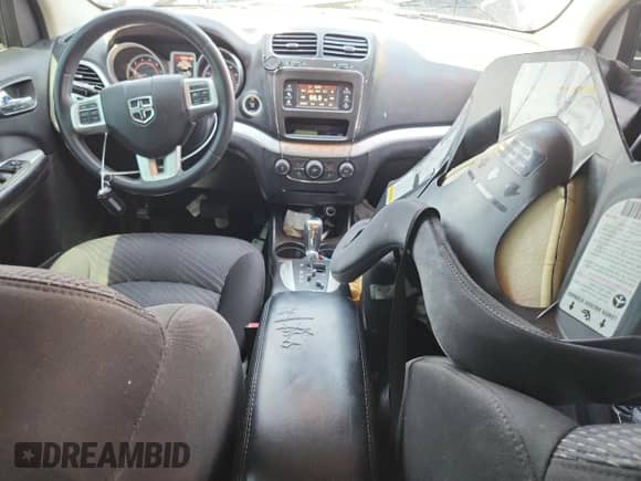 2014 Dodge Journey American Value с VIN 3C4PDCAB5ET308134, выставлен на аукционе Copart как лот 69113565 с пробегом 134 456 миль миль и Списание • Salvage title. История ставок и продаж доступна на DreamBid. Изображение 8.