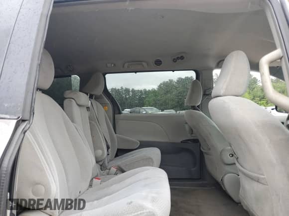 2011 Toyota Sienna LE with VIN 5TDKK3DC1BS033095, listed as a Copart auction lot 61135465 with 317,340 mi miles and Clean title. Bid and sale history available at DreamBid. Image 11.
