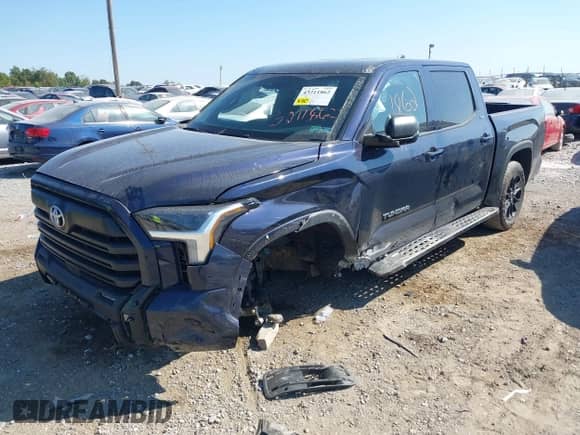 2025 Toyota Tundra SR with VIN 5TFLA5DB7SX262949, listed as a IAAI auction lot 43211862 with 7,809 mi miles and . Bid and sale history available at DreamBid. Image 2.