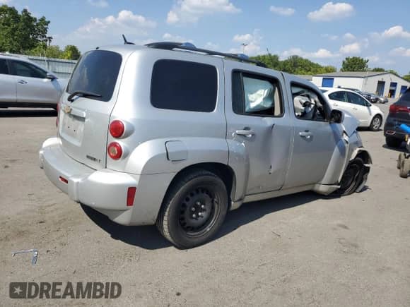 2010 Chevrolet HHR 1LT with VIN 3GNBABDBXAS560669, listed as a Copart auction lot 69191354 with Not provided miles and Salvage title. Bid and sale history available at DreamBid. Image 3.