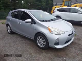 2013 Toyota Prius One with VIN JTDKDTB3XD1051060, listed as a IAAI auction lot 42851670 with 163,017 mi miles and . Bid and sale history available at DreamBid. Image 1.