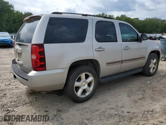 2007 Chevrolet Tahoe LTZ с VIN 1GNFK13087R217248, выставлен на аукционе Copart как лот 70634545 с пробегом 213 906 миль миль и Списание • Salvage title. История ставок и продаж доступна на DreamBid. Изображение 3.