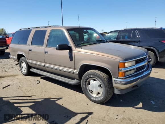 1998 Chevrolet Suburban z VIN 1GNFK16R6WJ306534, wystawiony jako Copart lot #75030844 z przebiegiem 230 869 mil mil oraz Czysty tytuł • Clean title. Historia ofert i sprzedaży dostępna na DreamBid. Obrazek 4.