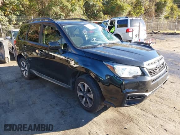 2018 Subaru Forester Premium z VIN JF2SJAEC5JH405628, wystawiony jako IAAI lot #43463543 z przebiegiem 106 481 mil mil oraz . Historia ofert i sprzedaży dostępna na DreamBid. Obrazek 1.