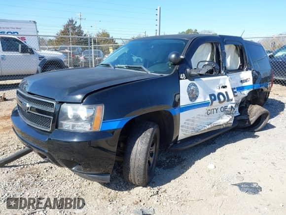 2014 Chevrolet Tahoe Commercial z VIN 1GNLC2E04ER158425, wystawiony jako IAAI lot #41526713 z przebiegiem Nie podano mil oraz . Historia ofert i sprzedaży dostępna na DreamBid. Obrazek 2.