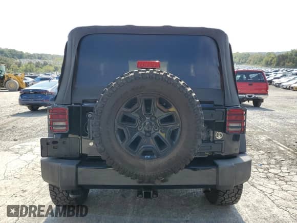 2016 Jeep Wrangler Willys Wheeler z VIN 1C4AJWAGXGL338868, wystawiony jako Copart lot #81030205 z przebiegiem 143 686 mil mil oraz Szkoda całkowita • Salvage title. Historia ofert i sprzedaży dostępna na DreamBid. Obrazek 6.