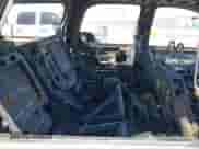 2007 Chevrolet Tahoe LTZ z VIN 1GNFC13037J103489, wystawiony jako IAAI lot #41560438 z przebiegiem Nie podano mil oraz . Historia ofert i sprzedaży dostępna na DreamBid. Obrazek 8.