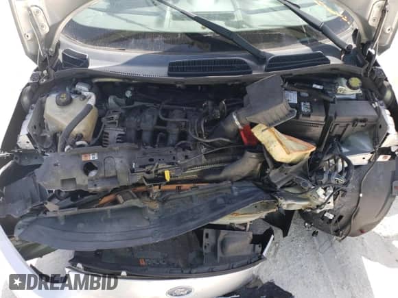 2016 Ford Fiesta S with VIN 3FADP4TJ9GM170699, listed as a Copart auction lot 59528543 with 96,394 mi miles and Salvage title. Bid and sale history available at DreamBid. Image 12.