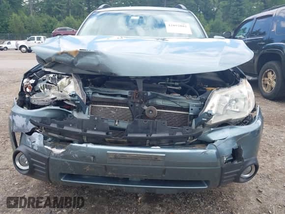 2012 Subaru Forester X Limited z VIN JF2SHAEC9CH422804, wystawiony jako IAAI lot #42892881 z przebiegiem 141 716 mil mil oraz . Historia ofert i sprzedaży dostępna na DreamBid. Obrazek 6.