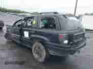 2002 Jeep Grand Cherokee Sport with VIN 1J4GW38SX2C168681, listed as a IAAI auction lot 42309763 with 216,553 mi miles and . Bid and sale history available at DreamBid. Image 3.