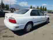 1997 Honda Accord LX with VIN 1HGCD5634VA244155, listed as a Copart auction lot 70736475 with 239,580 mi miles and Salvage title. Bid and sale history available at DreamBid. Image 3.