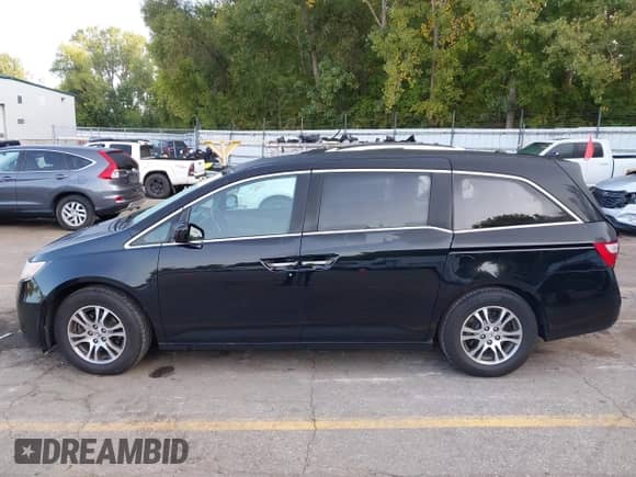 2013 Honda Odyssey EX-L с VIN 5FNRL5H64DB010252, выставлен на аукционе IAAI как лот 43171857 с пробегом 153 011 миль миль и . История ставок и продаж доступна на DreamBid. Изображение 14.