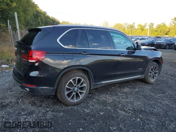 2017 BMW X5 xDrive35i с VIN 5UXKR0C30H0V74984, выставлен на аукционе Copart как лот 83763885 с пробегом 93 486 миль миль и Списание • Salvage title. История ставок и продаж доступна на DreamBid. Изображение 3.