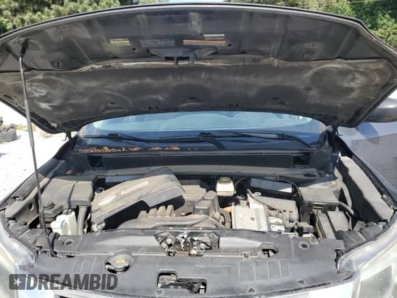 2014 Nissan Pathfinder Platinum Hybrid with VIN 5N1CR2MM7EC658332, listed as a Copart auction lot 71777405 with 159,998 mi miles and Clean title. Bid and sale history available at DreamBid. Image 12.