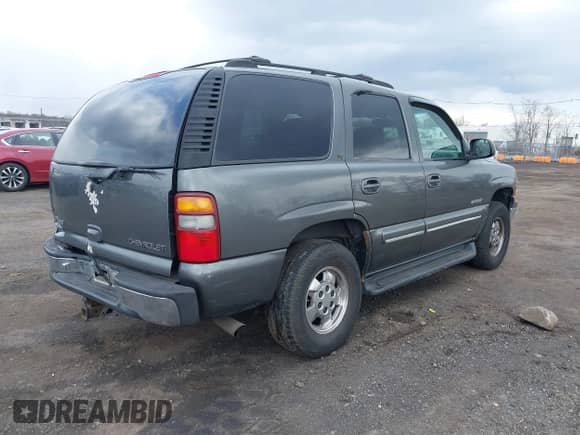 2000 Chevrolet Tahoe LS with VIN 1GNEK13T0YJ164874, listed as a IAAI auction lot 41893502 with 270,791 mi miles and . Bid and sale history available at DreamBid. Image 4.
