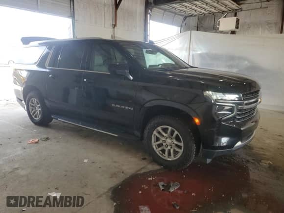 2021 Chevrolet Suburban LT with VIN 1GNSKCKD9MR172704, listed as a Copart auction lot 59959105 with 101,333 mi miles and Salvage title. Bid and sale history available at DreamBid. Image 4.
