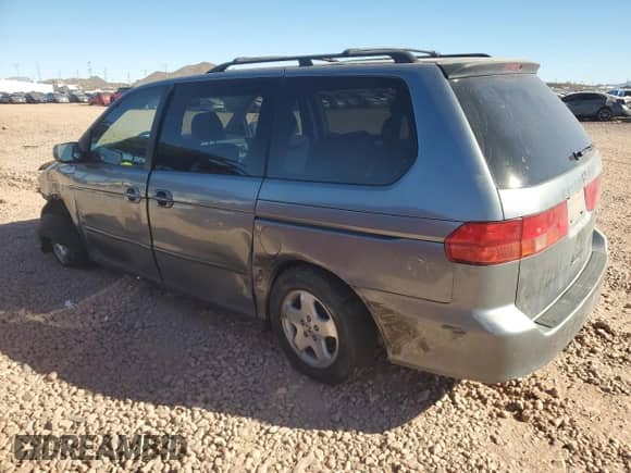 1999 Honda Odyssey EX с VIN 2HKRL1860XH541737, выставлен на аукционе Copart как лот 88897965 с пробегом 112 164 миль миль и Списание • Salvage title. История ставок и продаж доступна на DreamBid. Изображение 2.