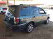 2006 Honda Pilot EX-L with VIN 5FNYF18746B013563, listed as a IAAI auction lot 42604056 with 250,068 mi miles and . Bid and sale history available at DreamBid. Image 4.