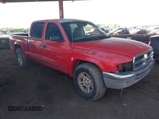 2002 Dodge Dakota SLT with VIN 1B7HL48X72S542335, listed as a IAAI auction lot 43320738 with 239,957 mi miles and . Bid and sale history available at DreamBid. Image 1.