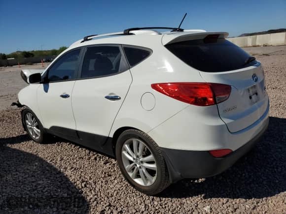 2011 Hyundai Tucson Limited with VIN KM8JU3AC7BU222304, listed as a Copart auction lot 71310104 with 118,726 mi miles and Salvage title. Bid and sale history available at DreamBid. Image 2.