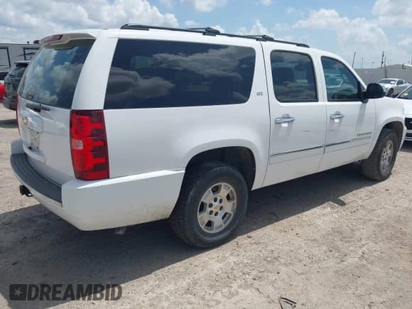 2013 Chevrolet Suburban LTZ with VIN 1GNSCKE01DR194888, listed as a IAAI auction lot 42722951 with 257,786 mi miles and . Bid and sale history available at DreamBid. Image 4.
