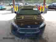 2015 Ford Focus SE z VIN 1FADP3K2XFL306875, wystawiony jako IAAI lot #43368410 z przebiegiem 220 758 mil mil oraz . Historia ofert i sprzedaży dostępna na DreamBid. Obrazek 12.