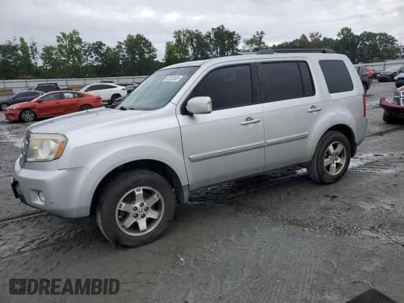 2009 Honda Pilot Touring with VIN 5FNYF38839B027611, listed as a Copart auction lot 67812505 with 148,357 mi miles and Salvage title. Bid and sale history available at DreamBid. Image 1.