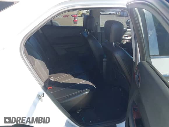 2012 Chevrolet Equinox LTZ z VIN 2GNFLGE5XC6108000, wystawiony jako IAAI lot #43306516 z przebiegiem 196 183 mil mil oraz . Historia ofert i sprzedaży dostępna na DreamBid. Obrazek 8.
