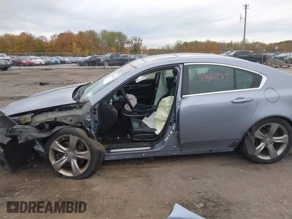 2012 Acura TL Auto z VIN 19UUA9F23CA002935, wystawiony jako IAAI lot #43467737 z przebiegiem 211 678 mil mil oraz . Historia ofert i sprzedaży dostępna na DreamBid. Obrazek 6.