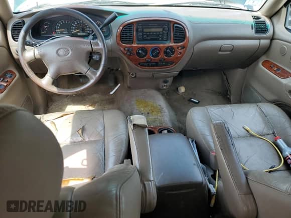 2001 Toyota Tundra Limited z VIN 5TBBT48101S167986, wystawiony jako Copart lot #64989255 z przebiegiem 217 919 mil mil oraz Czysty tytuł • Clean title. Historia ofert i sprzedaży dostępna na DreamBid. Obrazek 8.