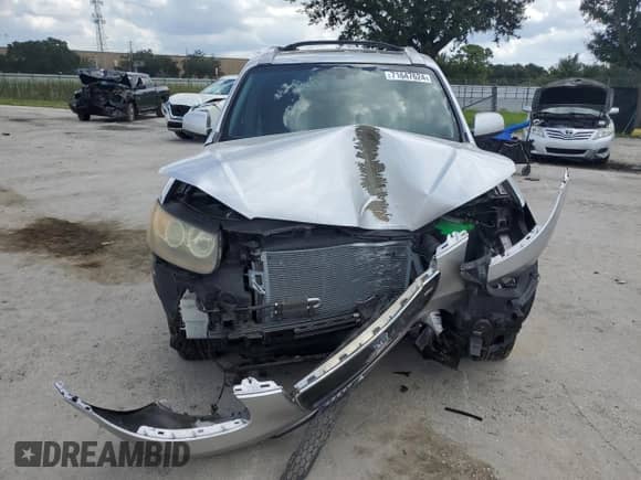 2007 Hyundai Santa Fe SE с VIN 5NMSH13E87H008565, выставлен на аукционе Copart как лот 71647624 с пробегом 77 478 миль миль и Списание • Salvage title. История ставок и продаж доступна на DreamBid. Изображение 5.